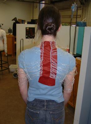 fitting crocheted silver shoulder piece
